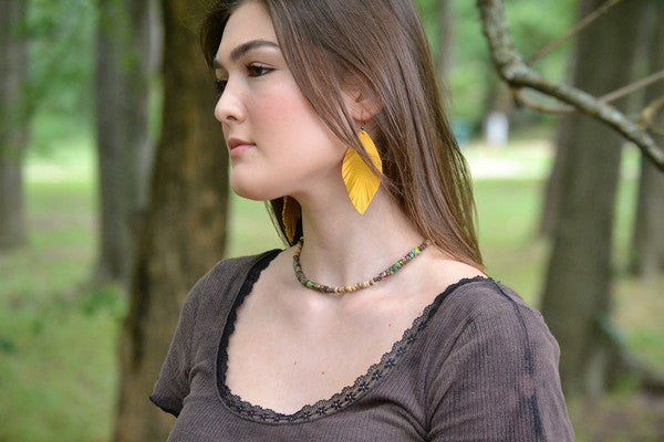 yellow suede feather earring- medium